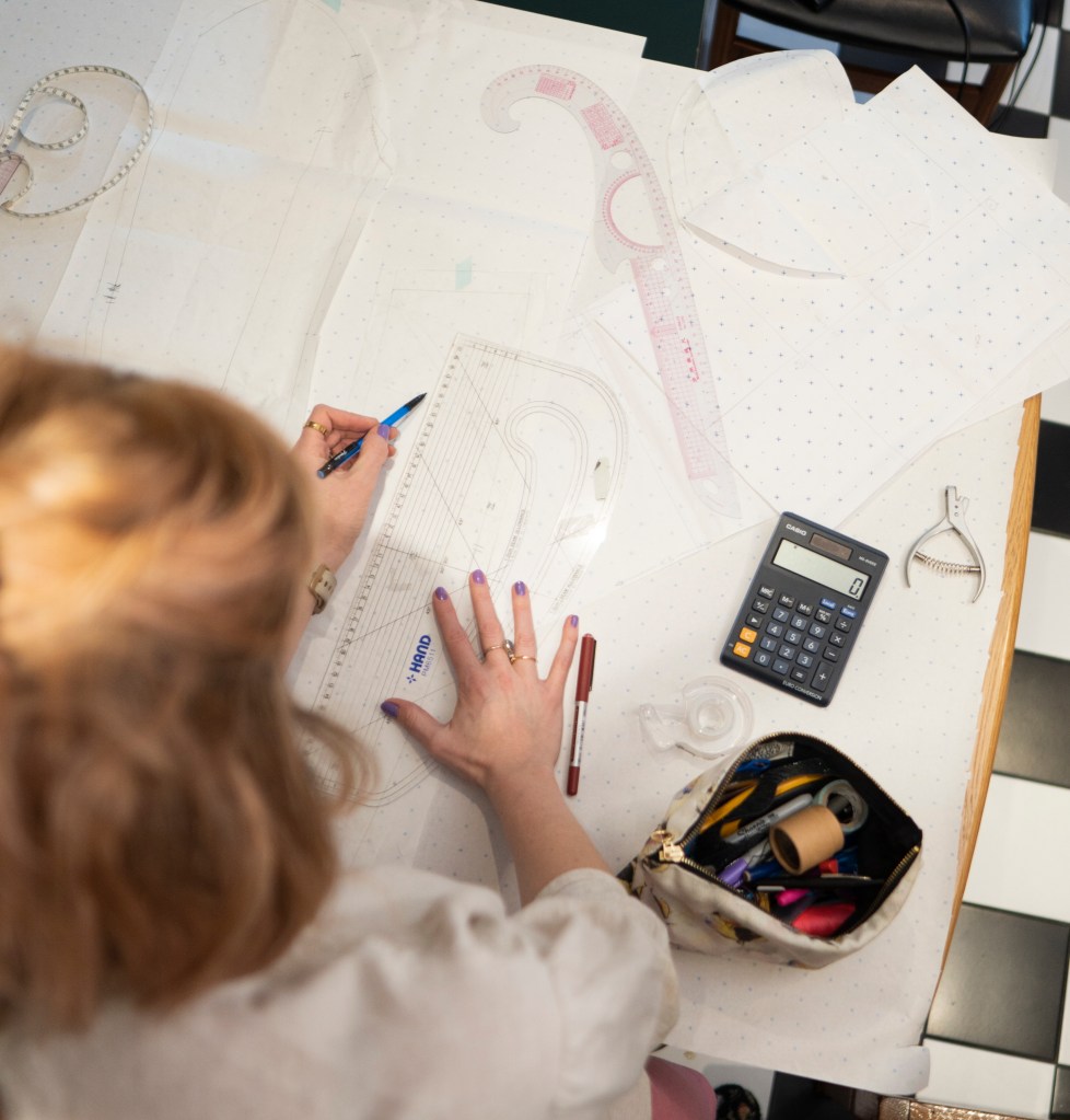 Becky from Pattern Paper Scissors, drafting a pattern