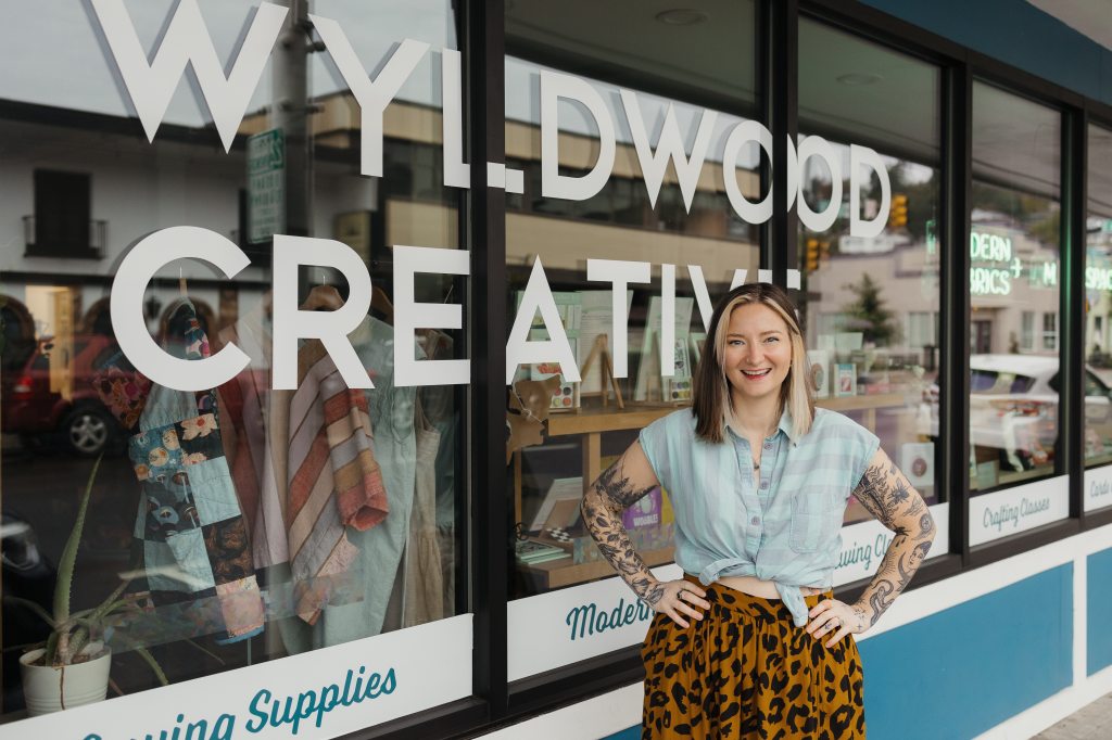 Tawnee Kinnebrew in front of her store Wyldwood Creative