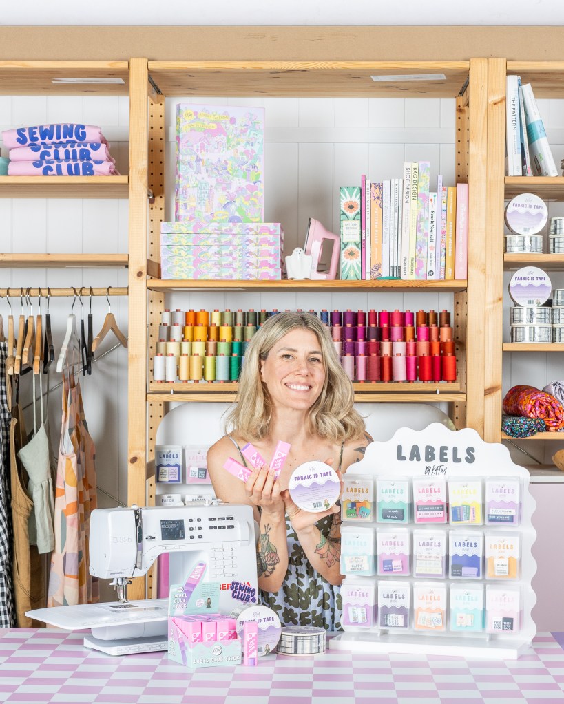 Kylie showcasing her products and packaging